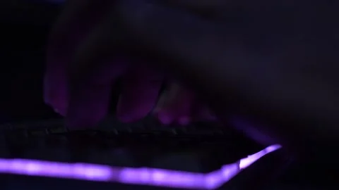 Typing on a RGB Keyboard Stock Footage 157942434