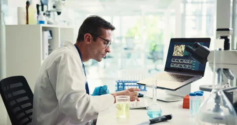 Typing, scientist and man with laptop, lab and medical research for test results Stock Footage 303507167