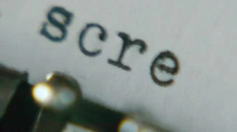 Typing "a screenplay by" on an old typewriter Vídeo Stock 22096679