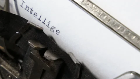 Typing Secret Artificial intelligence. Zoom in paperwork on an old typewriter Stock Footage 151856762