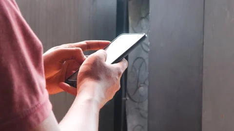 Typing smartphone Video stock 332527115