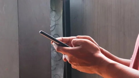 Typing smartphone Video stock 332527126