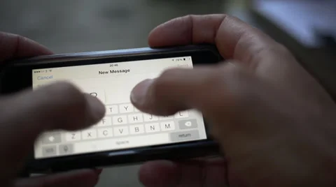 Typing on smartphone, message on iPhone Stock Footage 39817083