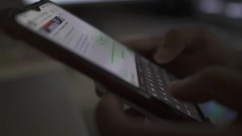 Typing smartphone on text message by hand Stock Footage 290949792