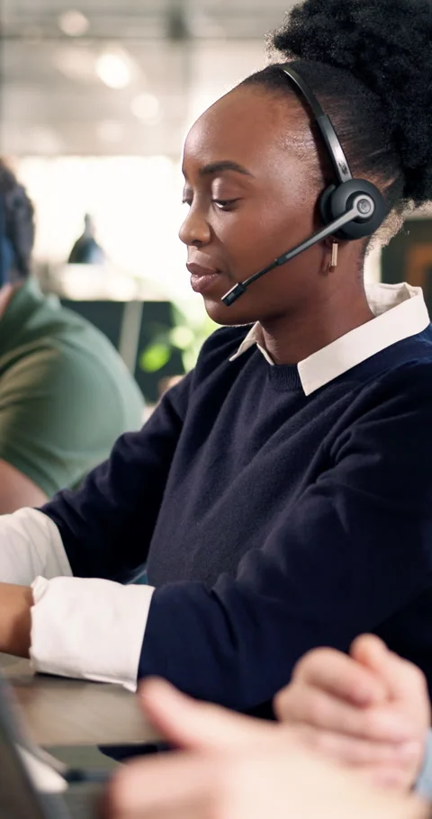 Typing, support and woman with headset in agency for customer service, online Stock Footage 340602009