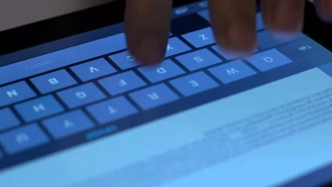 Typing on tablet 動画素材 210192328