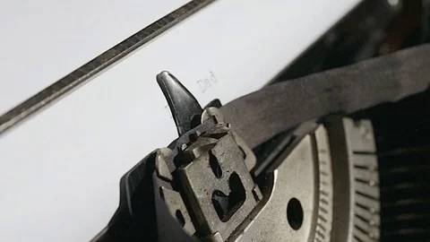 Typing text "Dear Dad" on white paper Video stock 75207899