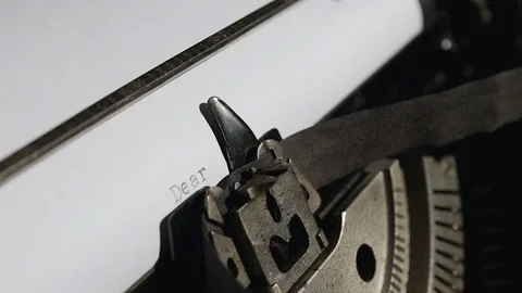 Typing text "Dear" on white paper Stock Footage 75207966