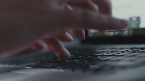 Typing text on a laptop computer keyboard. Black keyboard Video stock 70415376