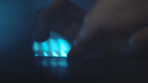 Typing text on laptop keyboard. Work on laptop at night, blue light. Macro. Stock Footage 151619926