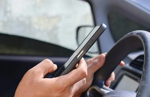 Typing a text message on a smartphone Stock Photos