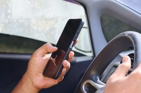 Typing a text message on a smartphone Stock Photos