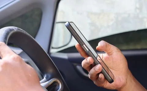 Typing a text message on a smartphone Stock Photos