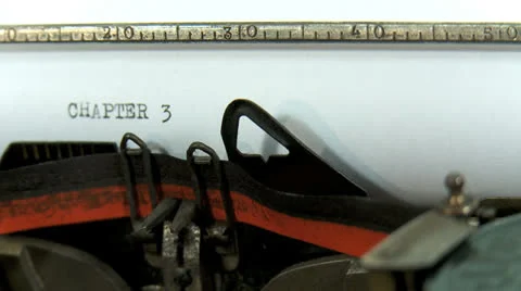 Typing a text on an old typewriter: Chapter 3 Stock Footage 23580938