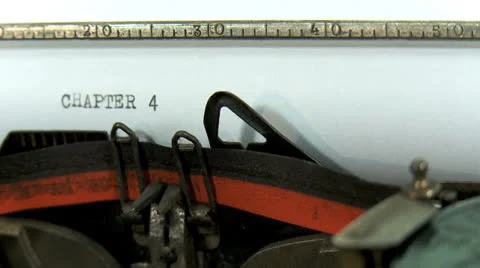 Typing a text on an old typewriter: Chapter 4 Stock Footage 23582068