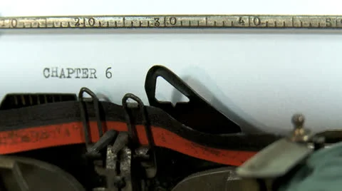 Typing a text on an old typewriter: Chapter 6 Stock Footage 23584867