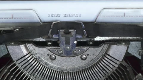 Typing text PRESS RELEASE. Typewriting on an old typewriter Stock Footage 170075197