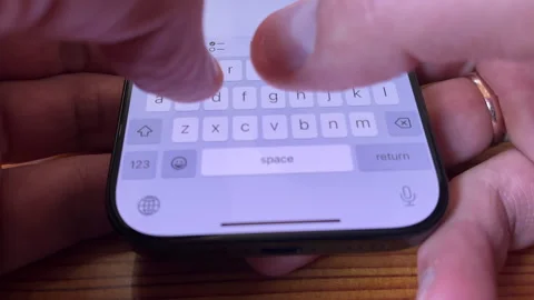 Typing Text on Smartphone Close-Up View Stock Footage 311937448