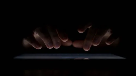 Typing text on a tablet keyboard in the dark Stock Footage 144319963