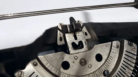 Typing text "typewriter" on white paper Video stock 74860877