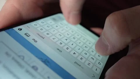 Typing a Text Using the Keyboard of a Smartphone Closeup Stock Footage 270815455