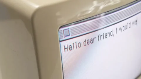 Typing a Text on a Vintage Old Mac Compuer Screen Closeup Stock Footage 263823804