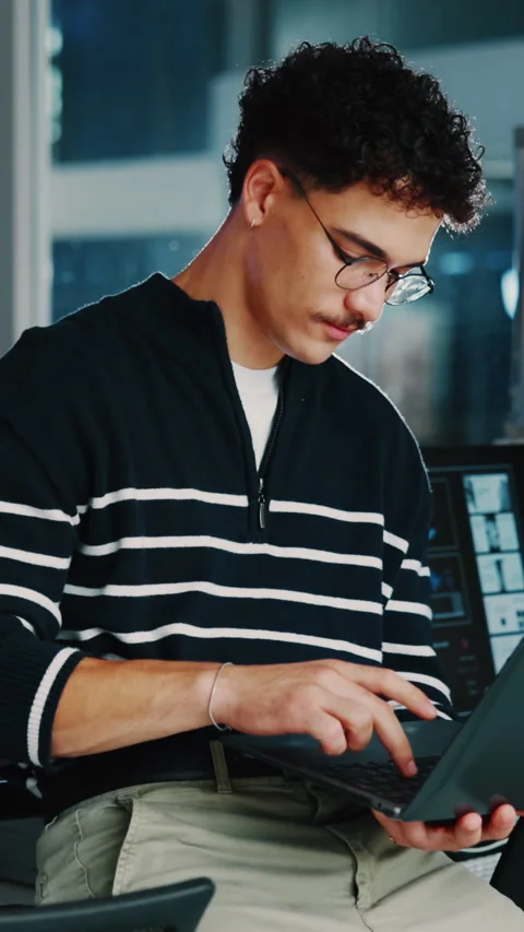Typing, thinking and man with programming, laptop for software development and Stock Footage 333249839