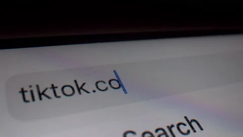 Typing TikTok domain in browser bar - Macro Video stock 145644847
