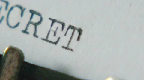 Typing "top secret" on an old typewriter Stock Footage