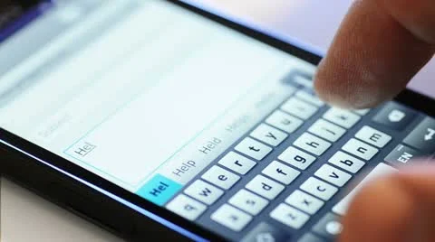 Typing on touch screen phone Stock Footage