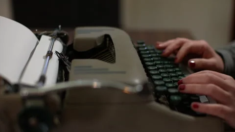Typing on a typewriter real time Stock Footage 262452738