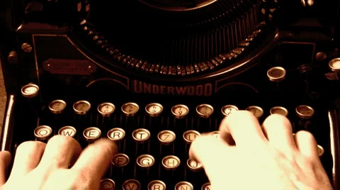 Typing with a vintage mechanical typewriter Stock Footage 1062009