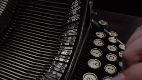 Typing on a Vintage Mechanical Typewriter Stock Footage 259415422