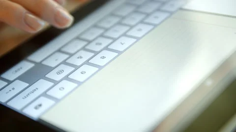 Typing on a virtual keyboard of tablet pc Stock Footage 42043823