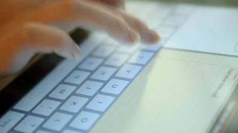 Typing on a virtual keyboard of tablet pc Stock Footage 42044100
