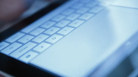 Typing on a virtual keyboard of tablet pc Stock Footage 51837189