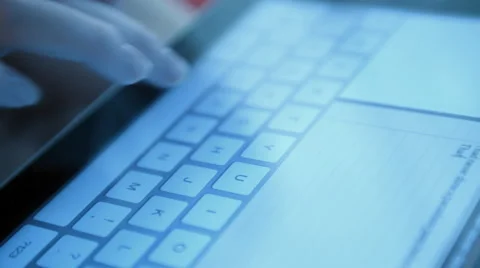Typing on a virtual keyboard of tablet pc Stock Footage 51837336