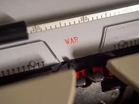 Typing "war" on an old electric typewriter 写真素材