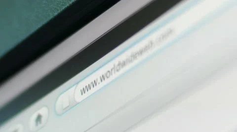 Typing web address in internet browser on computer screen Stock Footage