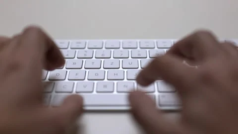 Typing on white computer keyboard, close up Stock Footage 219687523