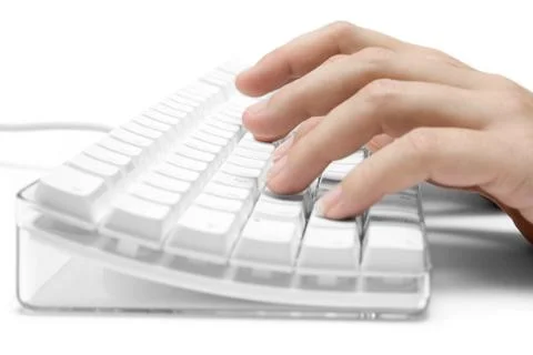 Typing on a White Computer Keyboard Isolated on a White Background 스톡 사진