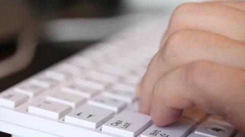 Typing on a white keyboard. hands closeup Stock Footage 72560538