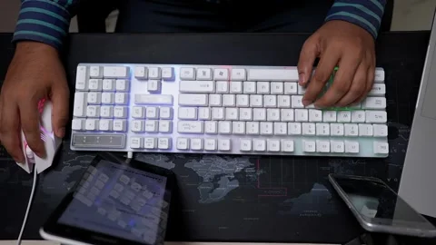 Typing on White Mechanical Keyboard with Gadgets Stock Footage 317737311