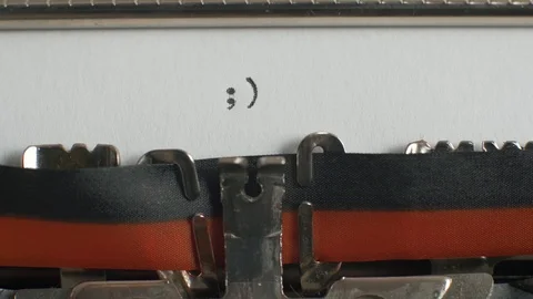 Typing winking emoticon on typewriter Video stock 87351387
