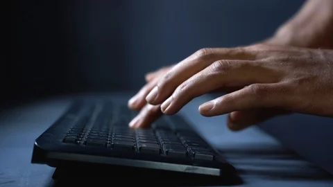 Typing on wireless computer keyboard 4k Stock Footage 121705489