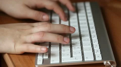 Typing on wireless keyboard Stock Footage 10840073