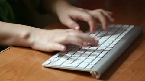 Typing on wireless keyboard Stock Footage 10840075