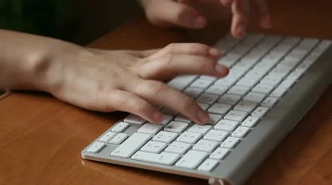 Typing on wireless keyboard Stock Footage 10840076