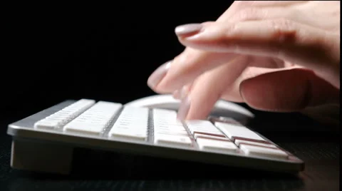 Typing on the wireless keyboard with mouse Stock Footage 57465212