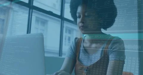 Typing woman developer coding at workspace desk by window, with laptop and code Stock Photos